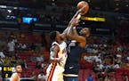 Timberwolves guard Jaylen Nowell tried to score against Heat forward Haywood Highsmith in the first half of an NBA preseason game Tuesday night.