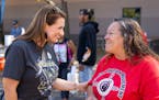 Minnesota Lieutenant Governor Peggy Flanagan chats with Jackie Neadeau, the director of AIM Minneapolis, at a “Get Out the Vote” event on Tuesday,