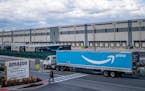 A truck arrives at the Amazon warehouse facility, in the Staten Island borough of New York, April 1, 2022. Amazon will hire 150,000 full-time, part-ti