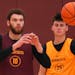 Gophers forward Jamison Battle (10), above catching a pass during practice at the Athletes’ Village training complex, was named to the All-Big Ten p