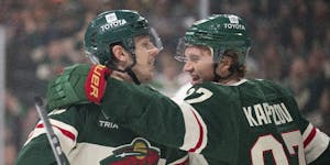 The Wild’s Marco Rossi, left, was congratulated by teammate Kirill Kaprizov after Rossi’s first-period goal in a 4-1 preseason victory over the Bl
