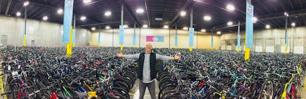 Free Bikes 4 Kidz Founder Terry Esau shows off the more than 9,000 used bicycles collected. Source: Free Bikes 4 Kidz