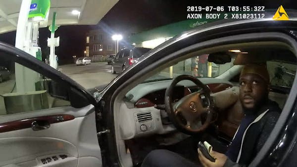 Bodycam video shows police officer Ty Jindra confronting Ramone Brown in his car
