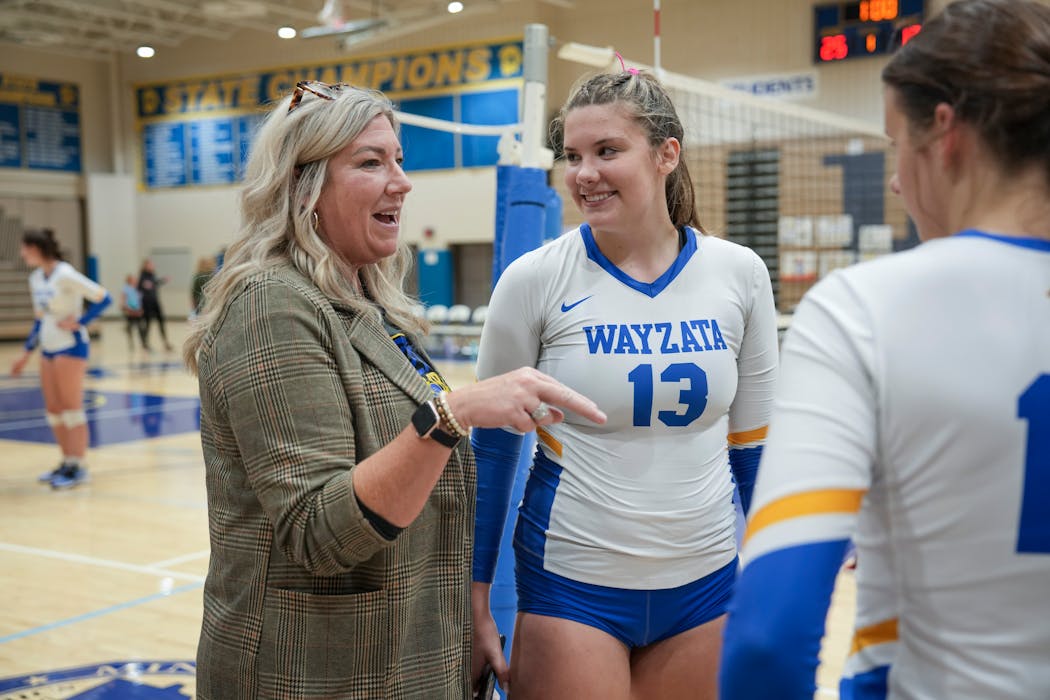 Vicki Swenson chats with Olivia Swanson after a recent match.