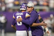 Vikings quarterback Kirk Cousins and coach Kevin O’Connell after their 29-22 win over the Bears on Sunday. 