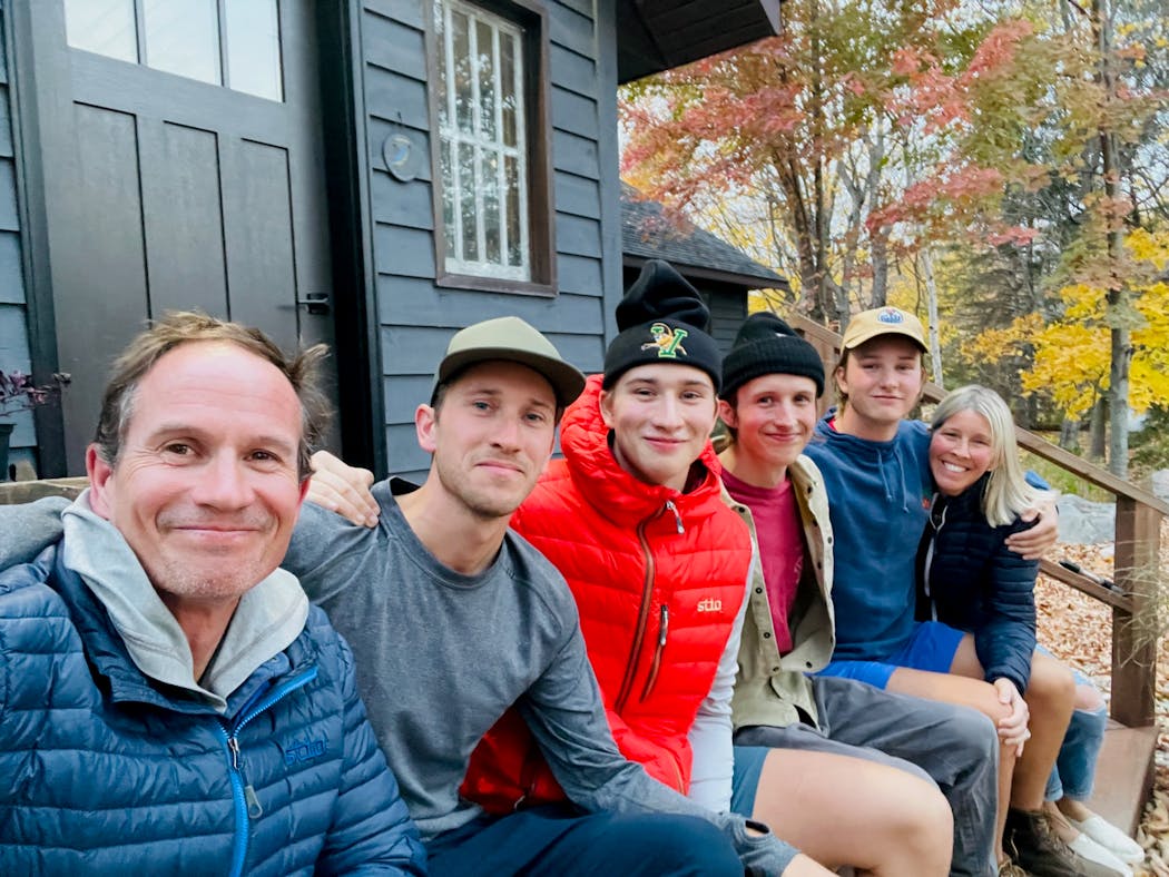 Maplelag Resort owners Jay and Jonell Richards with their four sons — Jake, Jens, Jack and Jon — on Oct. 10 while firefighters worked to extinguish a fire at the resort’s main lodge.