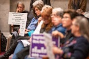 In 2018, a Planning Commission meeting attracted a crowd with signs for and against the 2040 Plan. 