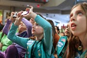Girl Scouts watched a live owl during a wildlife presentation by the Raptor Center in the rotunda of the Mall of America.