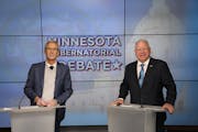 Republican Scott Jensen, left, and DFL Gov. Tim Walz debated each other Tuesday night in Rochester, three weeks before Election Day.