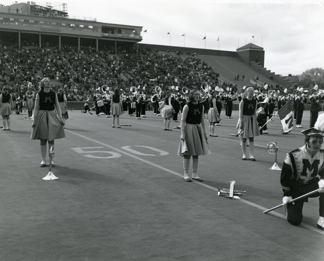 In 1972, the first year women were allowed to join the full ranks of the marching band, many wore yellow spats because there weren’t enough uniforms. They danced while women in regular uniforms marched and played instruments.
