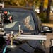 Marisa Coughlan in a scene that called for her to drive around Excelsior. The car was on a trailer for filming last week on the set of “Days When th