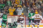 Gophers forward Matthew Knies celebrated after scoring the game-winning goal in overtime against North Dakota on Friday
