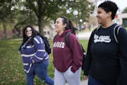 Denisse Carreon (center), a sophomore human services major, walked through campus with fellow classmates Joselin Gonzales Mejia (left) and Jasmin Gray