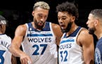 Rudy Gobert and Karl Anthony-Towns, shown together during an October game, were both sidelined by injuries Thuresday night.