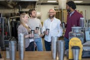 Forever Ware co-founder Natasha Gaffer, left, Chief Financial Officer Lee Sweatt and co-founders Nick Krumholz and Nolan Singroy gathered at Roots Cof