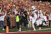 Minnesota Golden Gophers running back Mohamed Ibrahim (24) rushed for his third touchdown during the fourth quarter against the Rutgers Scarlet Knight