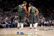 Rudy Gobert and Karl-Anthony Towns had a discussion during the Timberwolves’ loss at San Antonio on Sunday.