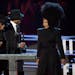 Janet Jackson, right, introduced inductees Terry Lewis, left, and Jimmy Jam during the Rock & Roll Hall of Fame Induction Ceremony on Saturday at the 