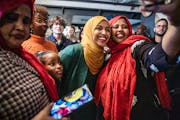DFL Congresswoman Ilhan Omar greets supporters as they gather for the election night party at the Eastro Restaurant & Event Center in Minneapolis, Min