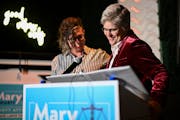 Hennepin County Attorney-elect Mary Moriarty, right, spoke to supporters alongside her partner, Jen Westmoreland, after they arrived victorious at Mor