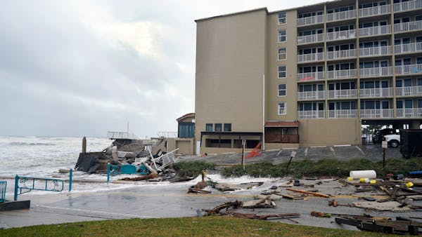 Tropical Storm Nicole topples beachfront homes