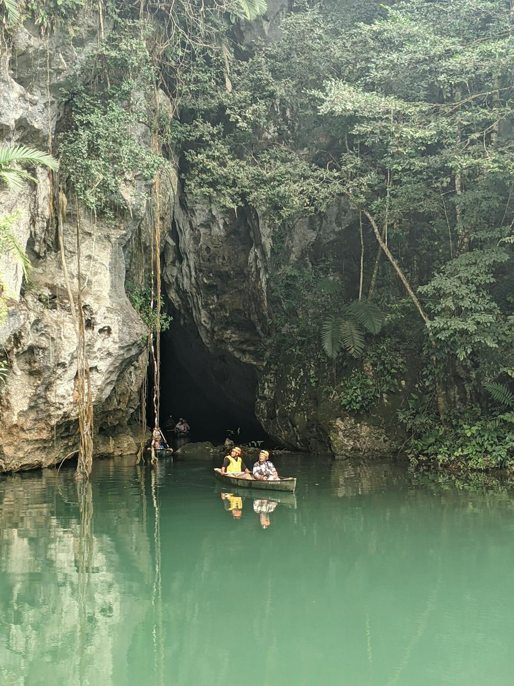 Paddlers emerged from Barton Creek Cave at the end of a tour. 