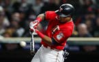 Luis Arraez of the Minnesota Twins hits a single against the Los Angeles Angels in the fifth inning at Target Field on Saturday, Sept. 24, 2022, in Mi