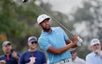 Tony Finau watches his tee shot on the 12th hole during the second round of the Houston Open