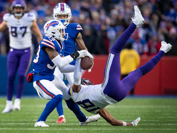Wide receiver Justin Jefferson makes a one-handed catch on fourth and 18 to keep the Vikings in the game late in the fourth quarter Sunday against Buf