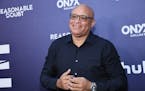 Larry Wilmore attended the premiere of “Reasonable Doubt” earlier this year.