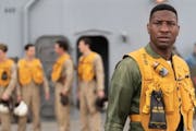 Jonathan Majors stars as a Navy pilot during the Korean War in fact-based “Devotion.”