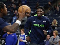 Minnesota Timberwolves guard Anthony Edwards smiles during warm ups prior to an NBA basketball game against the Houston Rockets, Saturday, Nov. 5, 202