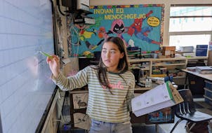 Churchill Elementary fourth-grader Ryleigh Shoberg taught her math group the steps to a problem last week in Cloquet. The school was named a national 