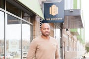 Devean George, outside the Commons housing complex he developed in north Minneapolis, plans a $19 million modular-home factory for the North Loop.