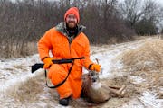 Sam Harris of Maple Grove with the spike buck he shot during firearms season at his family’s camp near Fergus Falls
