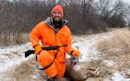 Sam Harris of Maple Grove with the spike buck he shot during firearms season at his family’s camp near Fergus Falls