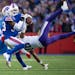Minnesota Vikings wide receiver Justin Jefferson (18) caught a deep pass in overtime on Buffalo Bills cornerback Cam Lewis (39) in Orchard Park.,N.Y. 