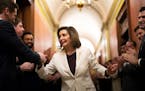 House Speaker Nancy Pelosi (D-Calif.) is greeted by staff after she announced that she would step down from her leadership position, on Capitol Hill i
