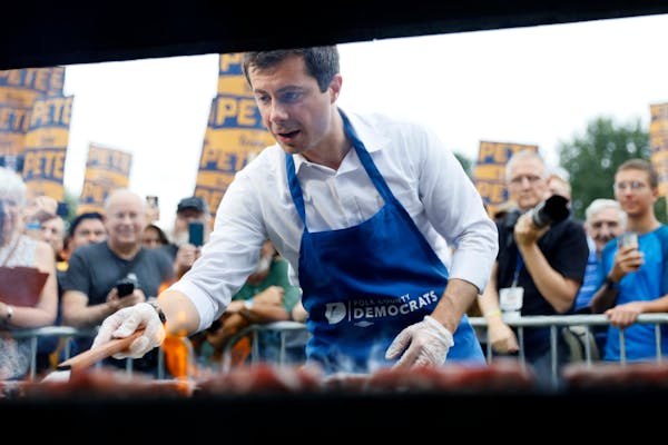 Democratic presidential candidate Pete Buttigieg worked an Iowa grill during the Polk County Democrats Steak Fry in September 2019.