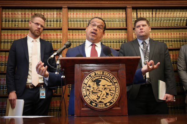 Minnesota Attorney General Keith Ellison details steps in his office’s review of the proposed merger on Tuesday with Assistant Attorneys General Col