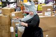 Mankato had the lowest unemployment rate of any city in the country in September. File photo of a worker at Fun.com, the Mankato-based online seller o