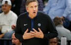 Minnesota Timberwolves head coach Chris Finch reacts to a referee’s call in the fourth quarter of an NBA basketball game against the Miami Heat Mond