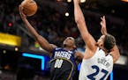 Timberwolves center Rudy Gobert (27) tried to block a shot by Pacers guard Bennedict Mathurin (00) on Wednesday in Indianapolis. Minnesota won 115-101