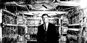 November 23, 1969 Keith J. Dineen, district manager for customer services, stands in the 'Guts' of Univac II When a group of high-class engineers took