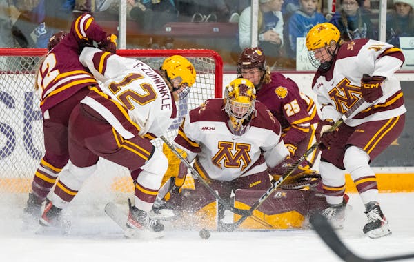 Gophers goaltender Skylar Vetter, above vs. Minnesota Duluth earlier this month, made nine saves and had an assist as Minnesota beat Penn State 5-1 on