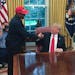 In this file photo, President Donald Trump meets with rapper Kanye West in the Oval Office of the White House in Washington, D.C, on Oct. 11, 2018. 