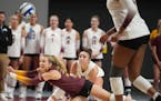 Gophers CC McGraw, above diving for a ball against Florida early this season, moved into third all-time in career digs on Friday in a win over Ohio St