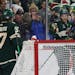 Wild winger Matt Boldy (12) pointed to winger Kirill Kaprizov (97) as they celebrated Boldy’s third-period goal against the Coyotes on Sunday. Kapri