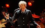 FILE - In this Jan. 12, 2012, file photo, Bob Dylan performs in Los Angeles. The music legend has quietly put concert tickets on sale for a tour in su