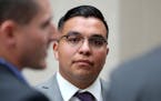 In this May 30, 2017, St. Anthony police officer Jeronimo Yanez stands outside the Ramsey County Courthouse ahead of his trial in the death of Philand